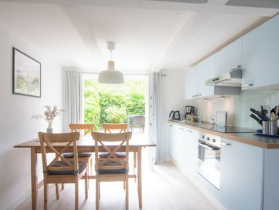 Cozy vacation home with private garden and view of the dike