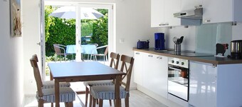 Cozy vacation home with private garden and view of the dike