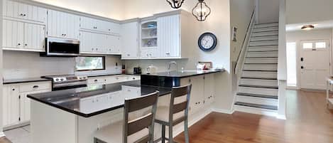 Coffee/tea maker, fridge, microwave, oven