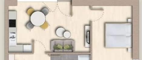 A floor plan of a hotel room with a bed, a seating area with a table and chairs, a kitchenette, and a bathroom.