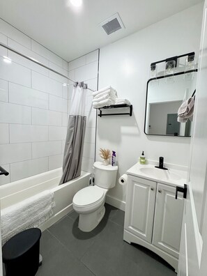 Hair dryer, towels, soap, toilet paper