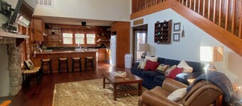 Country living with a cozy cabin and a fishing pond out back for your enjoyment!