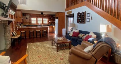 Country living with a cozy cabin and a fishing pond out back for your enjoyment!