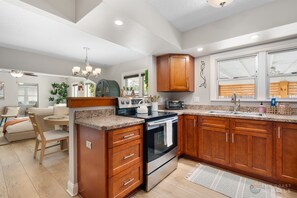 Fridge, microwave, oven, stovetop - Dog Friendly Home with Fenced Yard, Office, STEPS to Canal St. & Advent Health! (New Smyrna Beach)