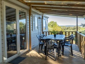 Outdoor dining - Comfortable mobile home in Calvisson for 4 people (Calvisson)
