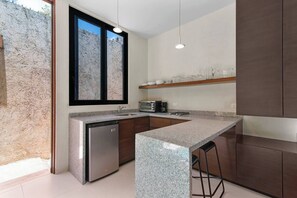 Fridge, stovetop, coffee/tea maker, cookware/dishes/utensils