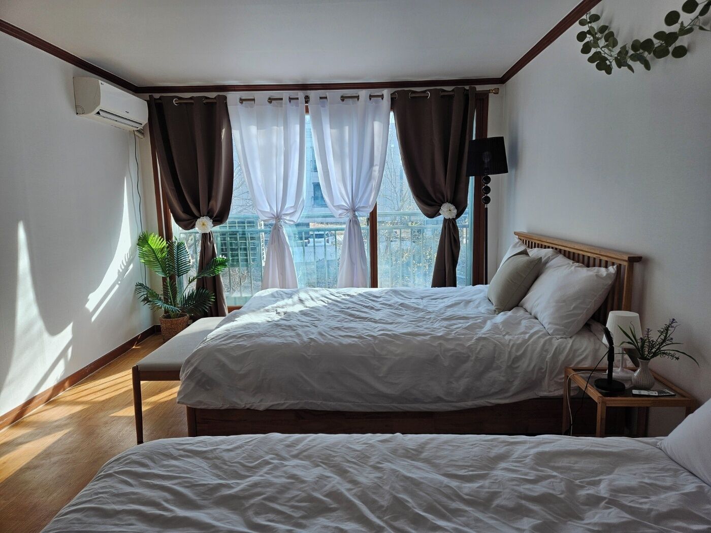 Premium bedding, down duvets, blackout curtains, iron/ironing board