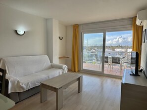 TV - Sunny Apartment with Pool and Canal View in Santa Margarita, Roses (Roses)