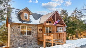 A lodge with a stone facade, a wooden deck, and a sign reading "Lodge 51". - Sbl51 The Hunt Cabin At Stonebridge 2 Bedroom Cabin (Branson West)