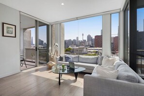 Living area - Lux 2BR apartment in Darling Harbour with Balcony Spa (Ultimo)