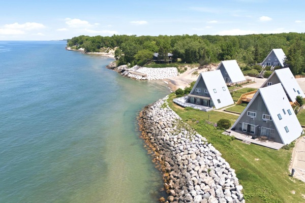Easy lake access for swimming, beach walks, and sunset views.