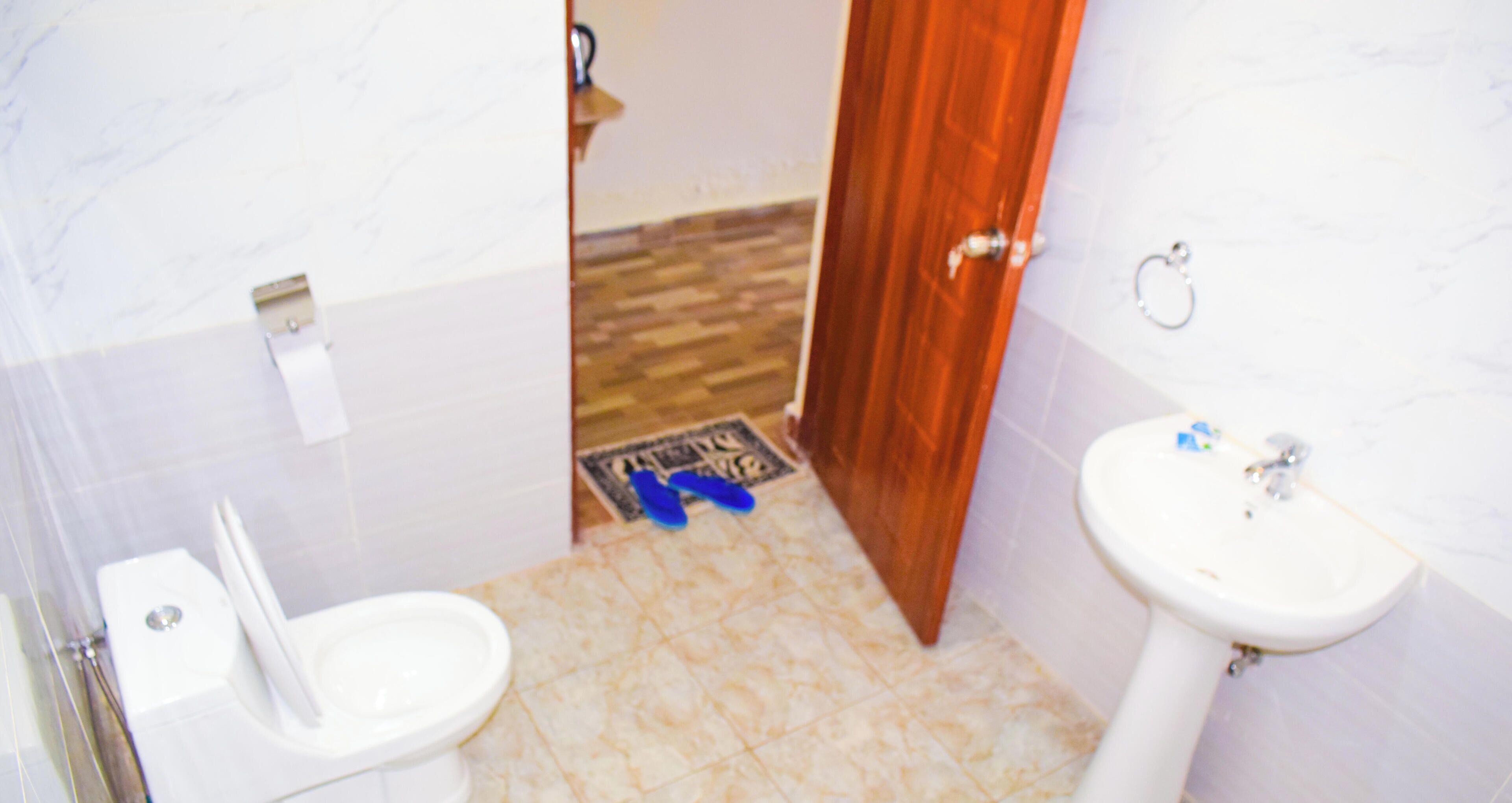 Double or Twin Room, Garden View | Bathroom | Shower, slippers, towels, soap