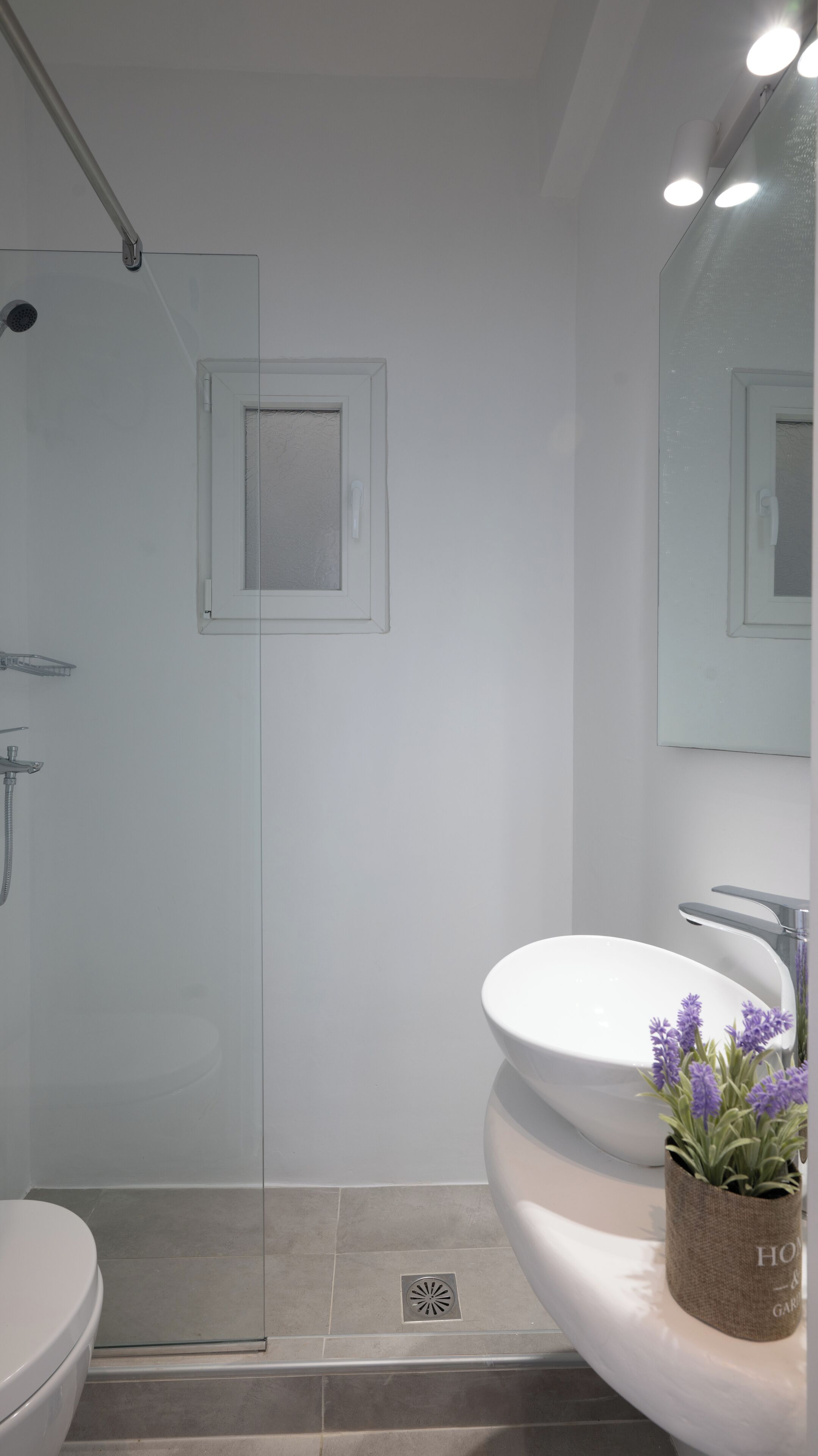 Shower, hair dryer, towels, toilet paper