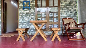 Deluxe Room, Garden View | Terrace/patio