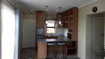 Luxury Apartment, Patio, City View | Private kitchen