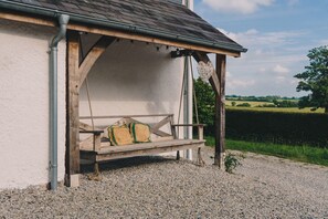 Property grounds - A beautifully appointed four-bedroom holiday cottage set in the peaceful village of Swimbridge. (Swimbridge)