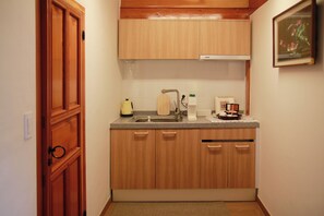 Traditional Double or Twin Room | Private kitchen | Mini-fridge, microwave, coffee/tea maker, toaster
