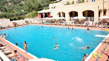 Seasonal outdoor pool, pool loungers