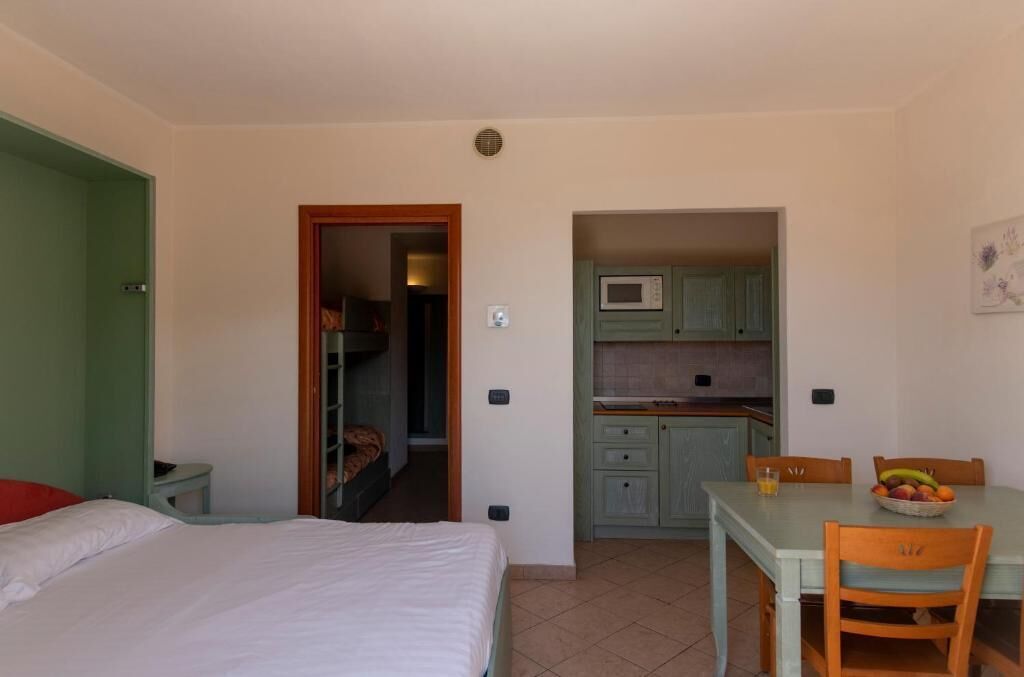 Premium Studio, Balcony, Pool View | In-room safe, iron/ironing board, free WiFi