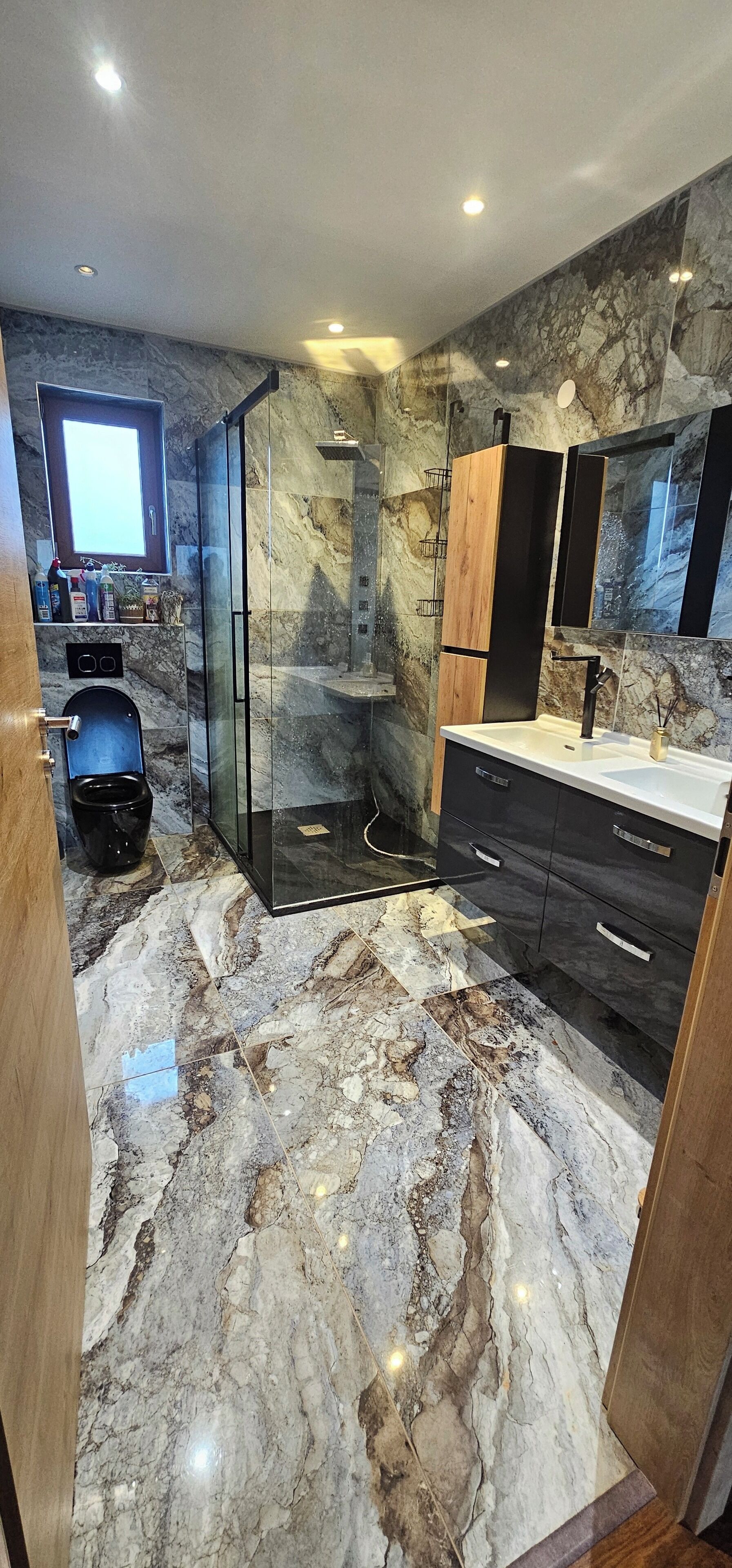 Shower, hair dryer, soap, toilet paper