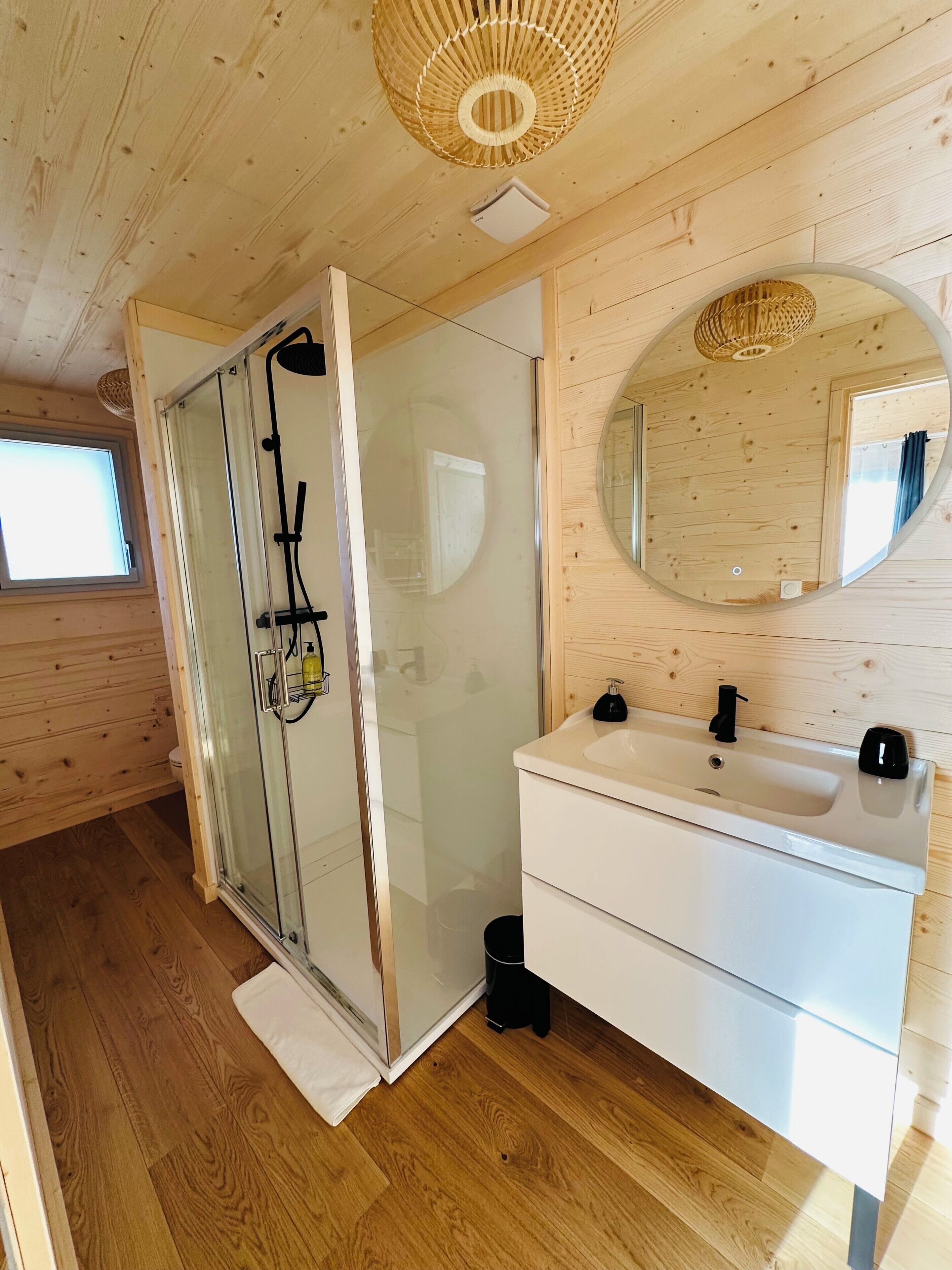 Shower, hair dryer, towels, toilet paper