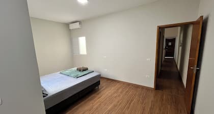 Apartment in the city center with air conditioning, ensuite bathroom, and fully equipped kitchen.