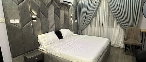 Family Room, Balcony, City View | Desk, laptop workspace, blackout curtains, soundproofing