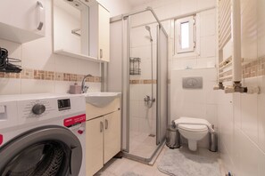 Hair dryer, bidet, towels, shampoo - Chic 2BR Gem on Moda’s Iconic Antiques Street (Istanbul)
