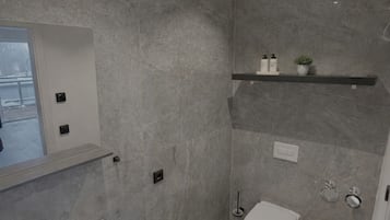 Kahden hengen deluxe-huone, keittotila | Kylpyhuone | Suihku, saippua, sampoo, vessapaperi