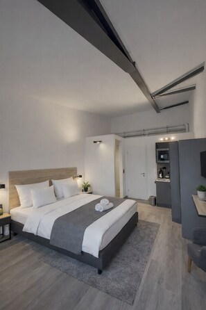 Deluxe Double Room, Kitchenette | Desk, laptop workspace, blackout drapes, soundproofing - OHA1 Hotel (Ellerhoop)