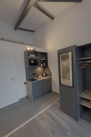 Deluxe Double Room, Kitchenette | Desk, laptop workspace, blackout drapes, soundproofing - OHA1 Hotel (Ellerhoop)