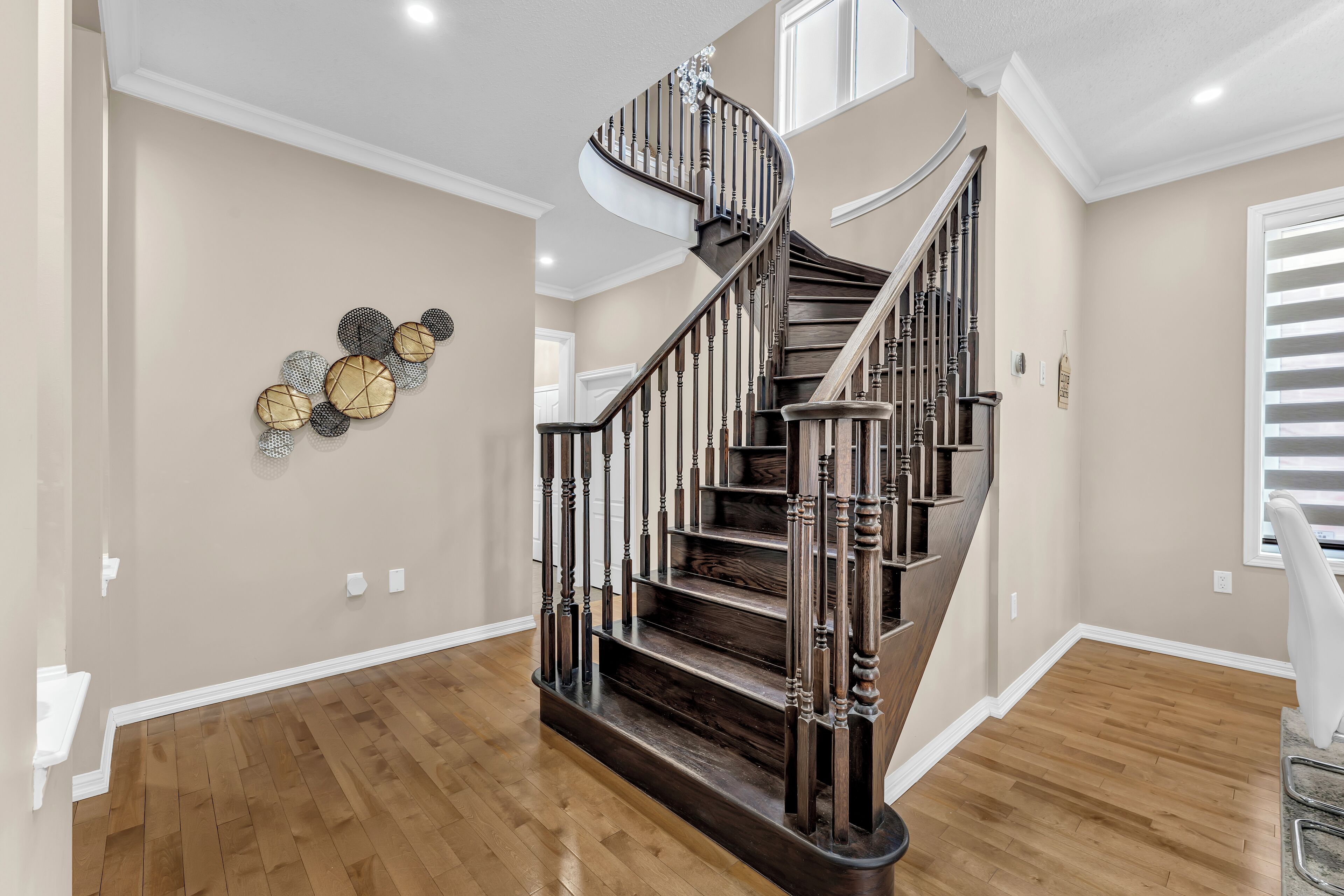 Polished staircase with modern railings