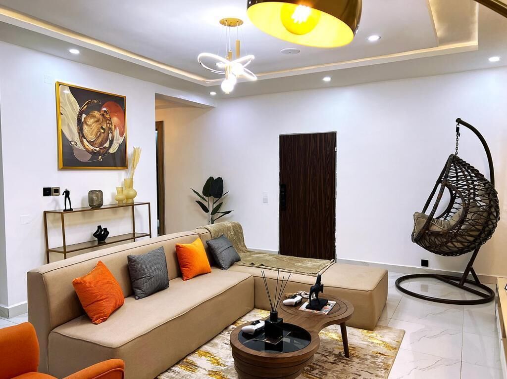 Departamento familiar, balcón, vista a la ciudad | Área de sala de estar