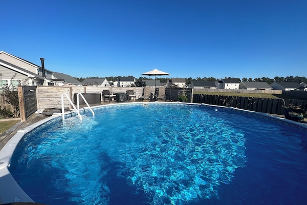Large pool and deck to rest and relax in during the warm season!