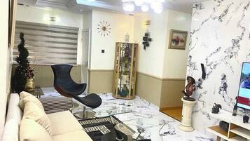 Economy Room, Balcony, City View | Living area