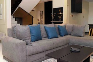 Economy Apartment, Balcony, City View | Living area - Malikis Court (Abuja)