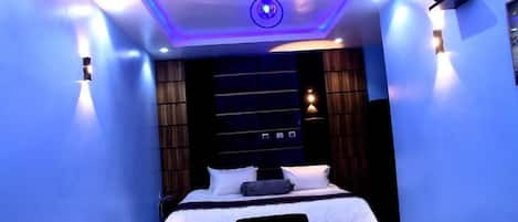 Economy Room, Balcony, City View | Desk, laptop workspace, blackout drapes, soundproofing