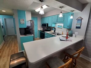 Fridge, microwave, oven, stovetop - Direct Oceanfront Condo with Pool and Beach Views (North Myrtle Beach)