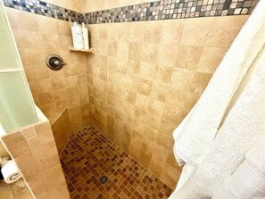 Shower, hair dryer, towels, soap