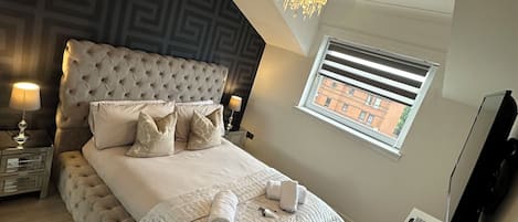 2 slaapkamers, een strijkplank/strijkijzer, wifi, beddengoed