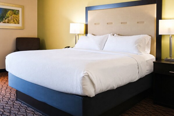 Tabla de planchar con plancha, wifi gratis y ropa de cama 