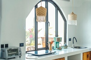Deluxe Villa, Patio, Courtyard View | Private kitchen | Mini-fridge, microwave, oven, stovetop
