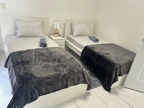 2 dormitorios, tabla de planchar con plancha, wifi y ropa de cama
