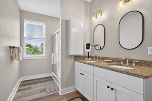 Shower, hair dryer, towels