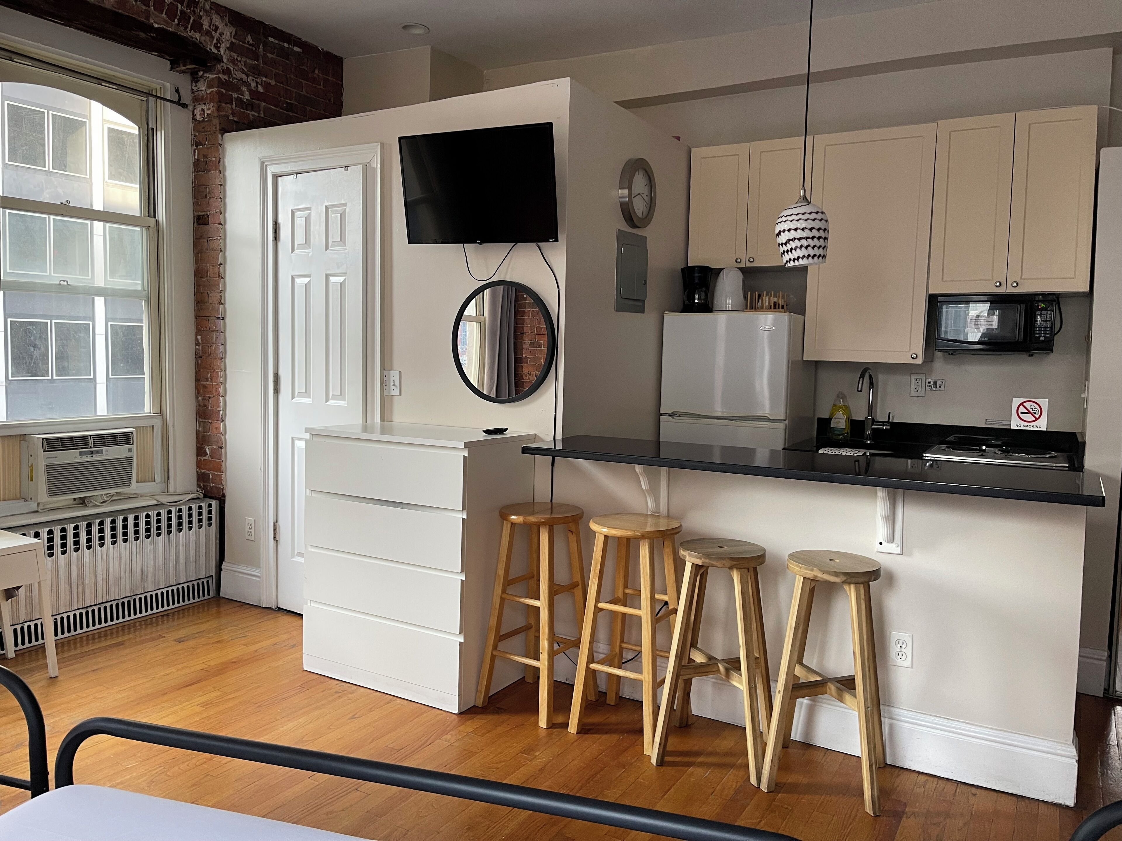 Fridge, microwave, stovetop, cookware/dishes/utensils