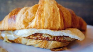 A sandwich with a folded bread exterior.