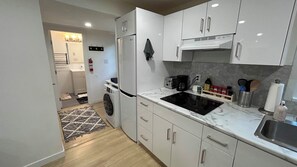 Microwave, stovetop, dishwasher - Cozy 2BR Garden Suite w/ Private Yard & EV Charger near Grouse Mountain & Trails (North Vancouver)
