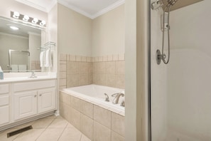 Shower, jetted tub, hair dryer, towels