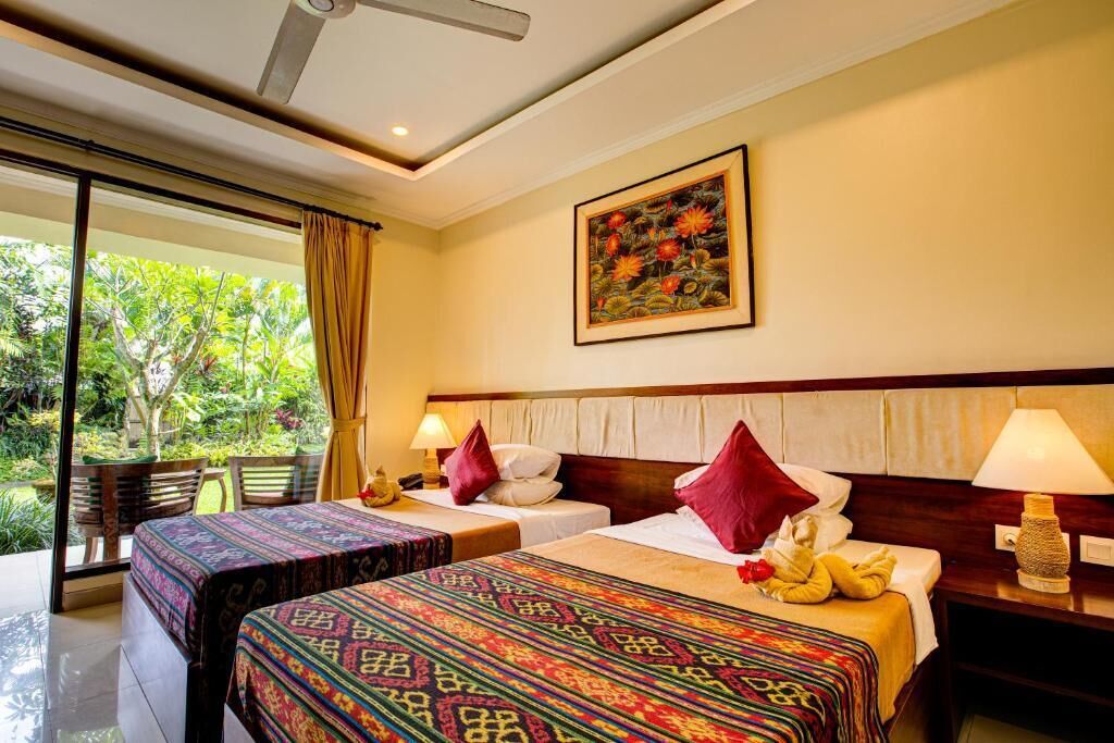 Quarto casal ou duplo luxo, vista para o jardim | Cofres nos quartos, Wi-Fi de cortesia