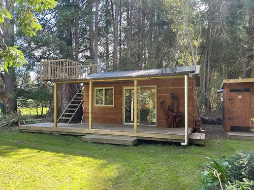 Secluded Redwood Cabin.  Built from a redwood tree that blew down in a cyclone